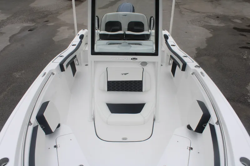 Slide: The Image of 2026 Tidewater 210 LXF boat interior with sleek seating and modern design. - 3