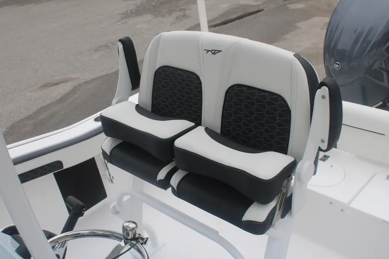 Slide: The Image of 2026 Tidewater 210 LXF boat seats with black and white upholstery, showcasing modern design. - 5