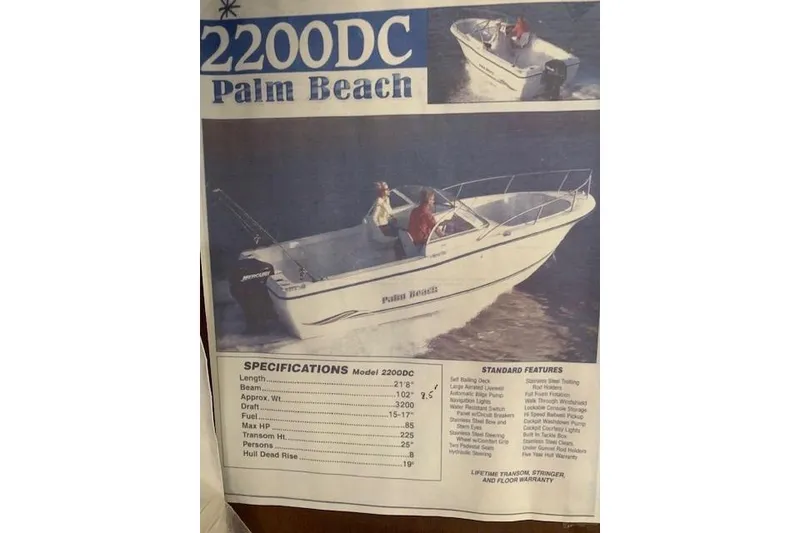 Slide: The Image of 2003 Palm Beach 22 Dual Console boat brochure with specifications and features. - 20