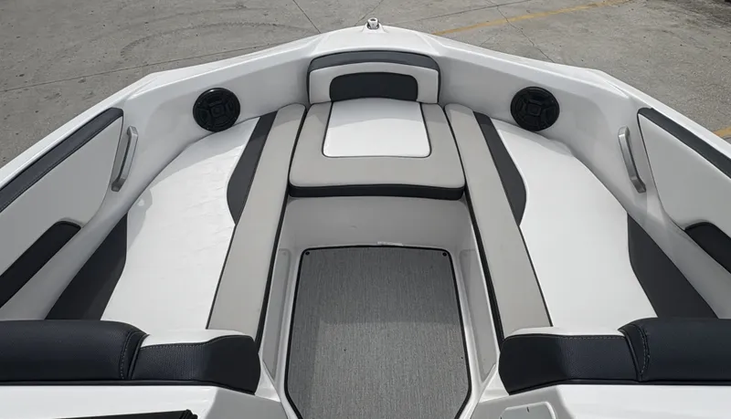 Slide: The Image of 2024 Yamaha Boats AR 195 interior seating with sleek design and modern upholstery. - 15