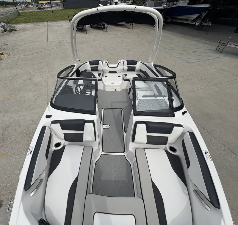 Slide: The Image of 2024 Yamaha Boats AR 195 interior with sleek seating and modern design. - 8