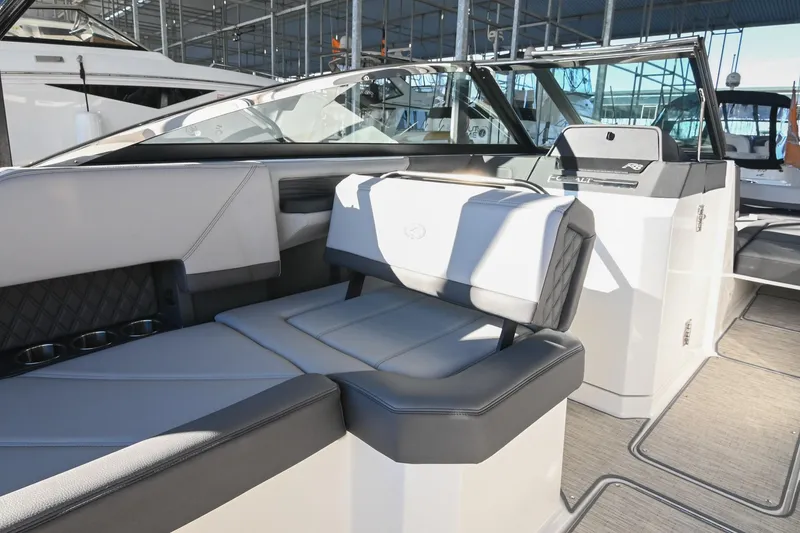 Slide: The Image of 2024 Cobalt R8 boat interior with sleek seating and modern design. - 21