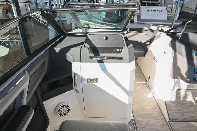 Slide: The Image of 2024 Cobalt R8 boat interior with luxurious seating and modern design. - 24
