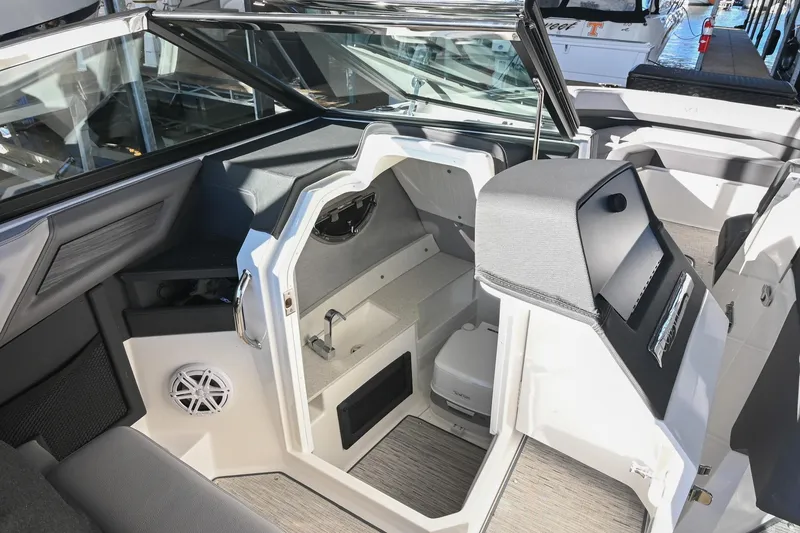 Slide: The Image of 2024 Cobalt R8 boat interior with luxurious seating and modern design. - 26