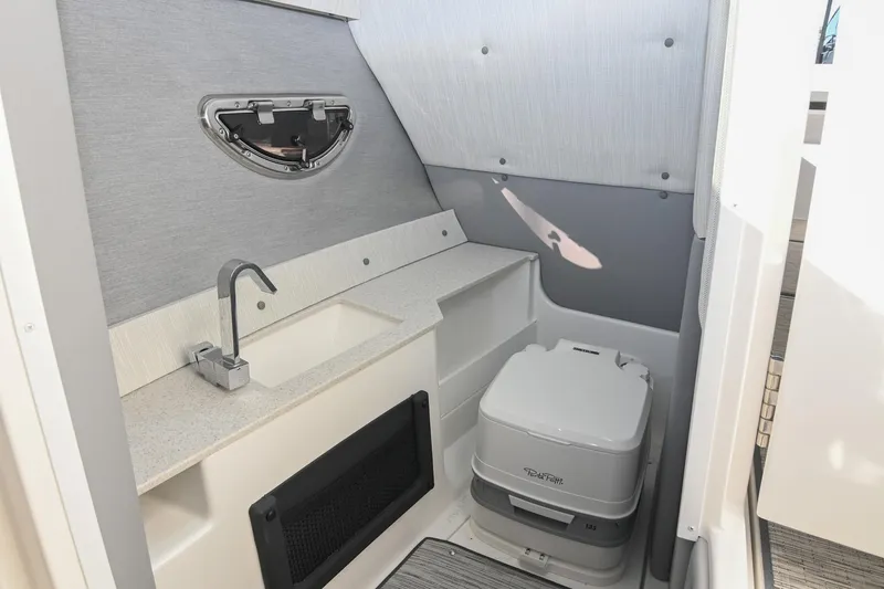 Slide: The Image of 2024 Cobalt R8 boat interior with sleek design and modern amenities. - 27