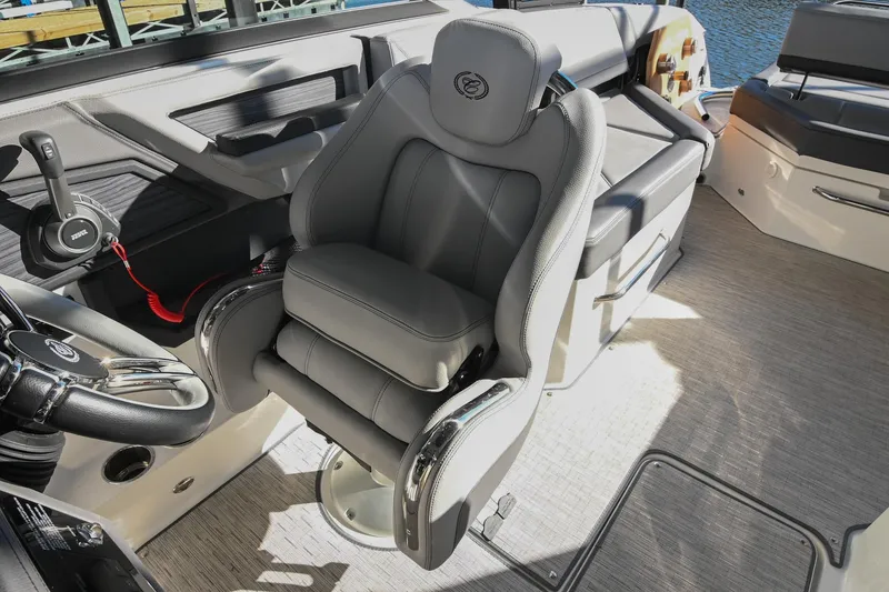 Slide: The Image of 2024 Cobalt R8 boat control panel with Volvo Penta throttle and digital display. - 34