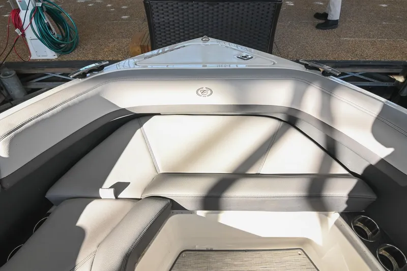 Slide: The Image of 2024 Cobalt R8 boat interior with luxurious seating and cup holders. - 43