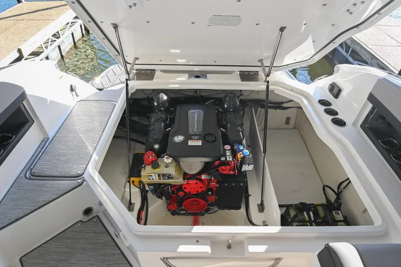 Slide: The Image of 2024 Cobalt R8 boat interior with luxurious gray seating and cup holders. - 45