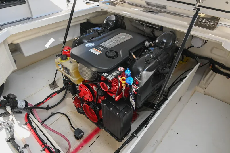 Slide: The Image of Engine compartment of 2024 Cobalt R8 boat, showcasing modern design and components. - 48