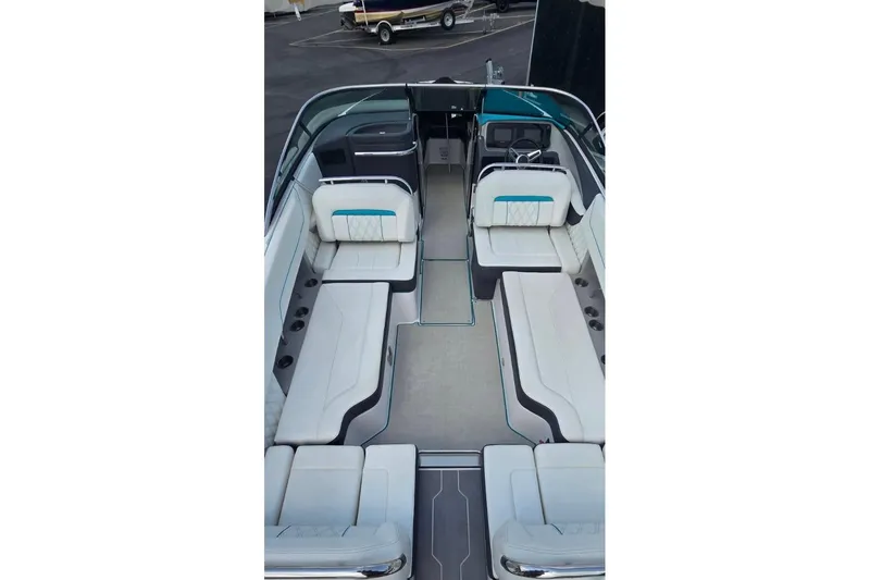 Slide: The Image of 2020 Regal LS6 boat interior with spacious seating and modern design. - 9