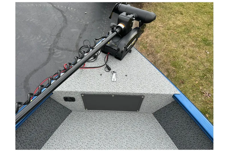 Slide: The Image of 2026 Lund 1675 Adventure Sport boat with trolling motor on deck. - 16