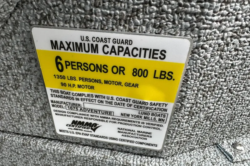 Slide: The Image of 2026 Lund 1675 Adventure Sport capacity label, 6 persons or 800 lbs, U.S. Coast Guard compliant. - 22