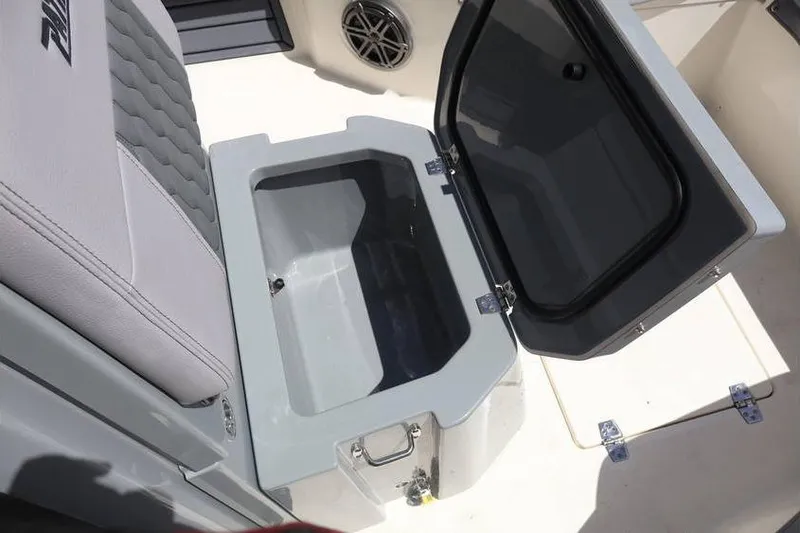 Slide: The Image of Open storage compartment on 2025 Pathfinder 2200 TRS boat, featuring sleek design and functionality. - 10