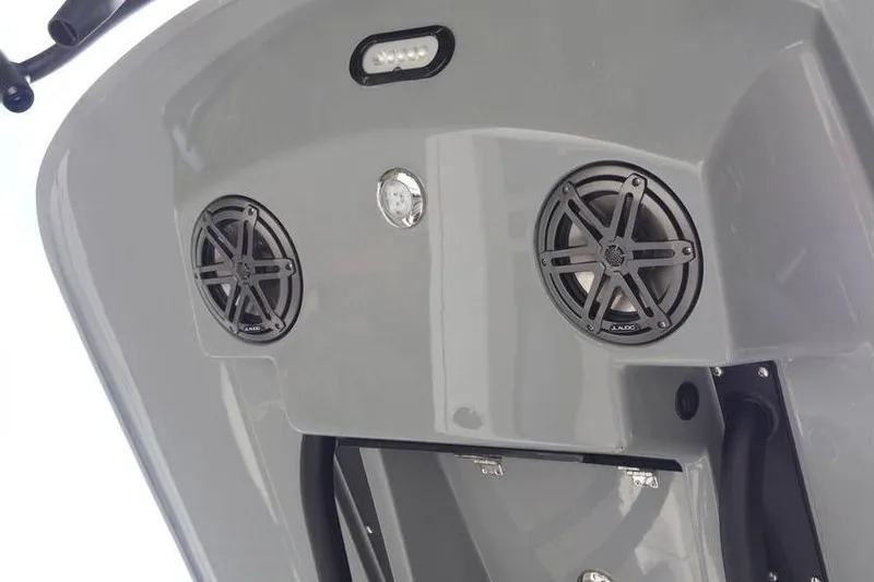 Slide: The Image of 2025 Pathfinder 2200 TRS boat speakers and light on gray panel. - 13