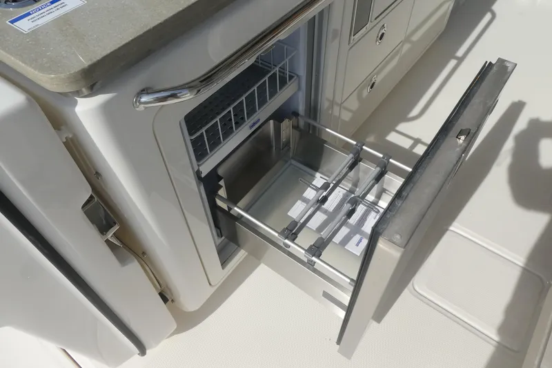 Slide: The Image of Open drawer refrigerator on 2026 Boston Whaler 380 Realm boat. - 13