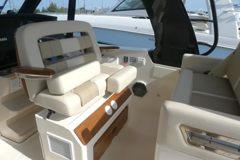 Slide: The Image of Luxury seating on 2026 Boston Whaler 380 Realm boat interior. - 15