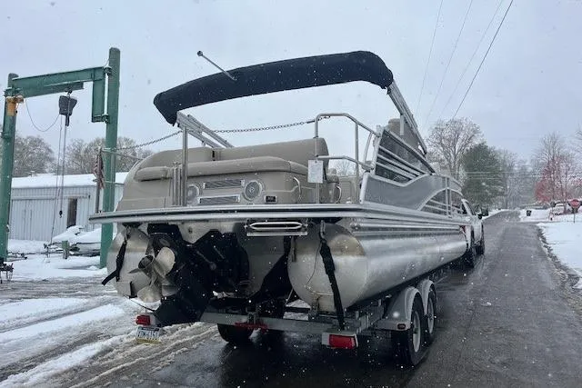 Slide: The Image of 2016 Harris Grand Mariner SEL 250 pontoon boat on trailer in snowy setting. - 4