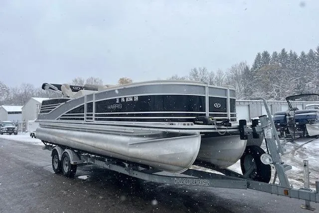 Slide: The Image of 2016 Harris Grand Mariner SEL 250 pontoon boat on trailer in snowy setting. - 5
