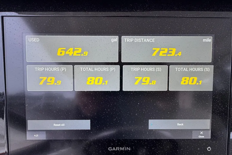 Slide: The Image of 2023 Pursuit S 328 Sport boat in a workshop on stands, side view. - 6