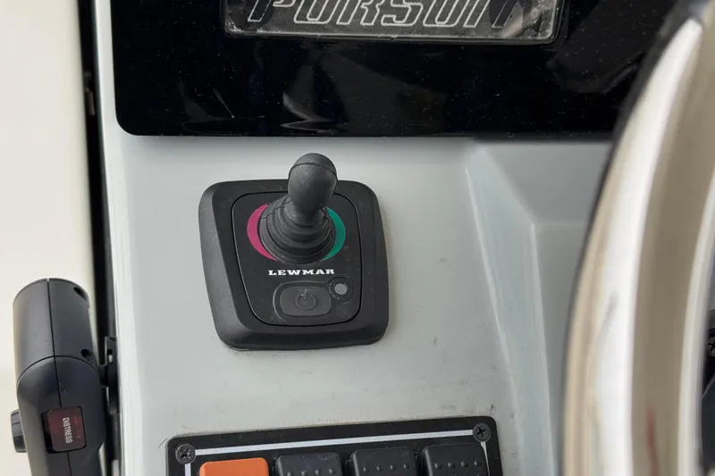 Slide: The Image of 2023 Pursuit S 328 Sport boat interior with storage and utility area. - 9