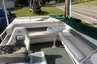 Slide: The Image of 2001 Harris-Kayot Classic 240 O/B pontoon boat with spacious seating and table. - 2