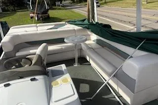 Slide: The Image of 2001 Harris-Kayot Classic 240 O/B pontoon boat with spacious seating and helm. - 5