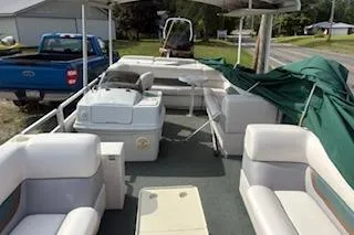 Slide: The Image of 2001 Harris-Kayot Classic 240 O/B pontoon boat with spacious seating and covered area. - 8