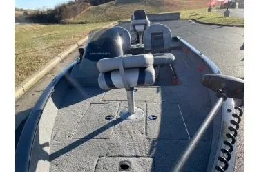 Slide: The Image of 2018 Tracker Super Guide V-16 SC fishing boat on a sunny day. - 8