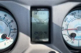 Slide: The Image of Close-up of 2020 Axis A22 boat dashboard with speedometer and digital display. - 3