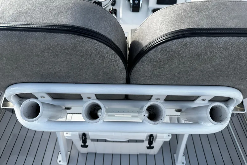 Slide: The Image of 2022 Sea Pro 239 Center Console boat seat with rod holders and cooler. - 15