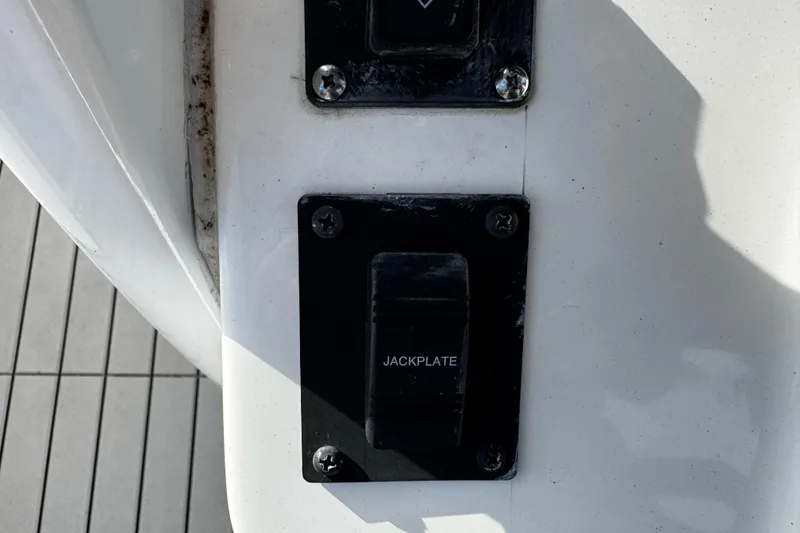 Slide: The Image of 2022 Sea Pro 239 Center Console jackplate switch on boat deck. - 28