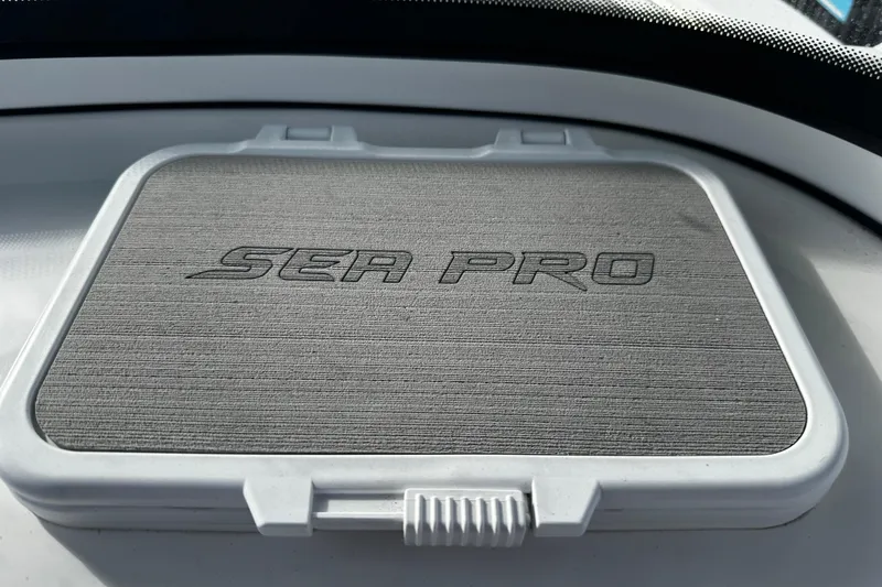Slide: The Image of 2022 Sea Pro 239 Center Console logo on boat hatch cover. - 32