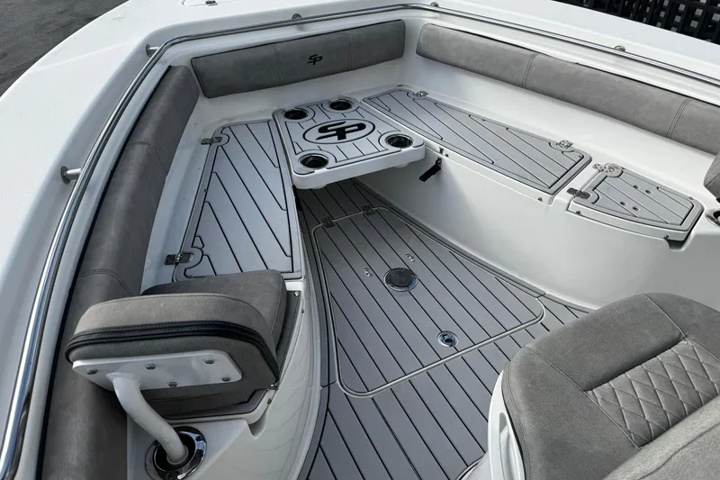 Slide: The Image of 2022 Sea Pro 239 Center Console boat interior with gray seating and deck. - 35