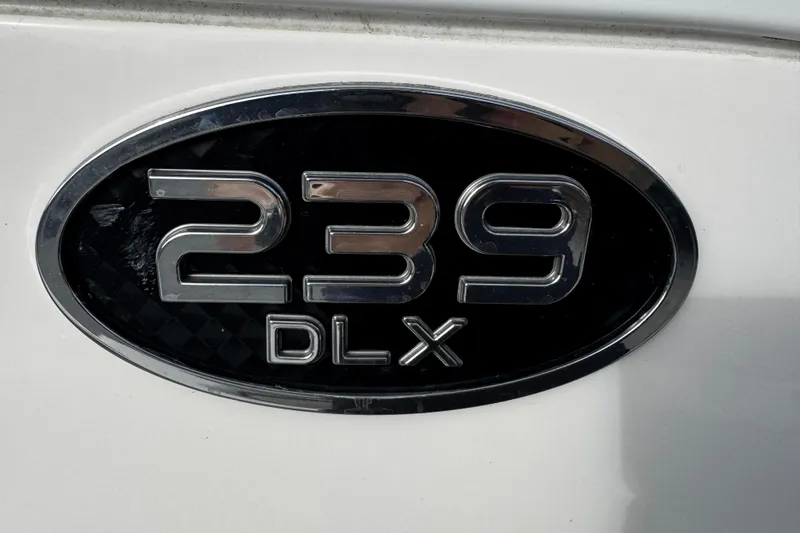 Slide: The Image of Sea Pro 239 DLX emblem on 2022 Center Console boat. - 44