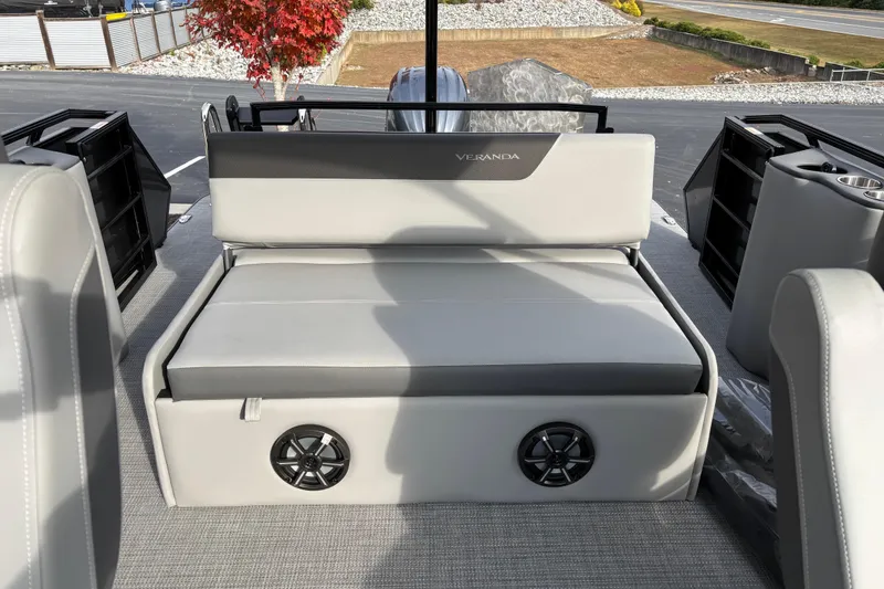 Slide: The Image of 2026 Veranda Relax VR 235 VLI boat interior with cushioned seating and built-in speakers. - 10