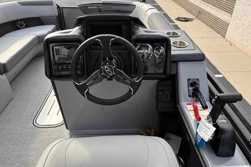 Slide: The Image of 2026 Veranda Relax VR 235 VLI boat cockpit with steering wheel and control panel. - 7