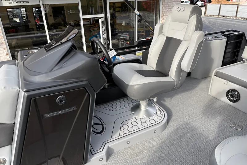 Slide: The Image of 2026 Veranda Relax VR 235 VLI boat interior with modern captain's chair and sleek dashboard. - 8