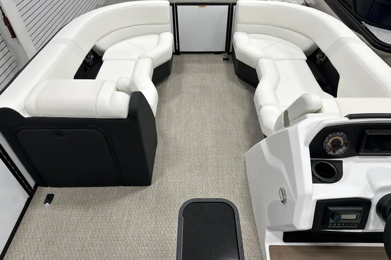 Slide: The Image of Luxurious interior of 2026 Evotti 521CS boat with white seating and modern dashboard. - 16