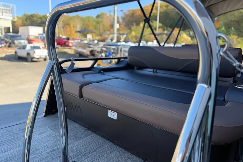 Slide: The Image of 2026 Avalon 2585 LSZ Entertainer boat interior with sleek seating and chrome details. - 6