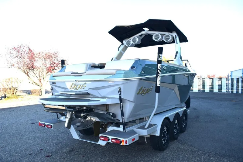 Slide: The Image of 2026 Tigé Z3 boat on trailer, featuring sleek design and advanced audio system. - 10
