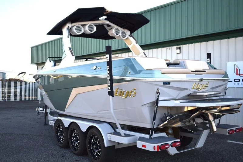 Slide: The Image of 2026 Tigé Z3 boat on a trailer, featuring sleek design and modern amenities. - 13