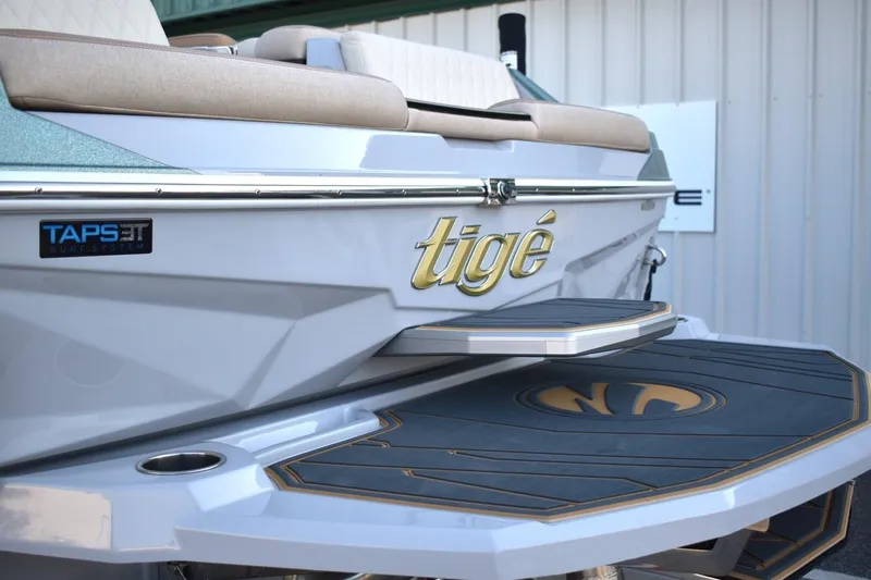 Slide: The Image of 2026 Tigé Z3 boat rear view with TAPS 3T surf system and stylish seating. - 15