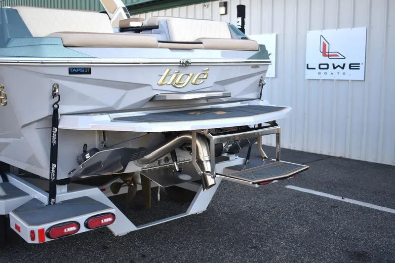 Slide: The Image of 2026 Tigé Z3 boat rear view with swim platform and TAPS 3T system. - 19