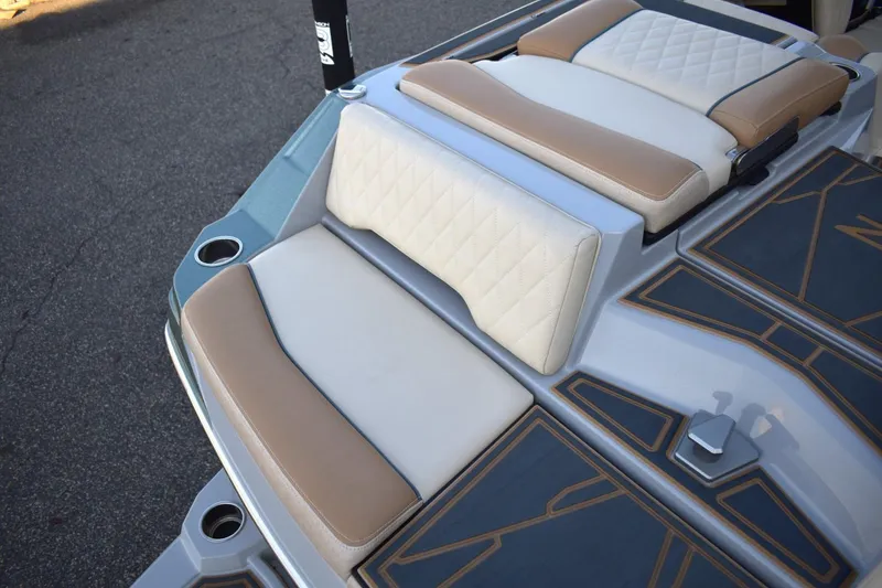 Slide: The Image of 2026 Tigé Z3 boat interior with beige and white cushioned seating. - 22