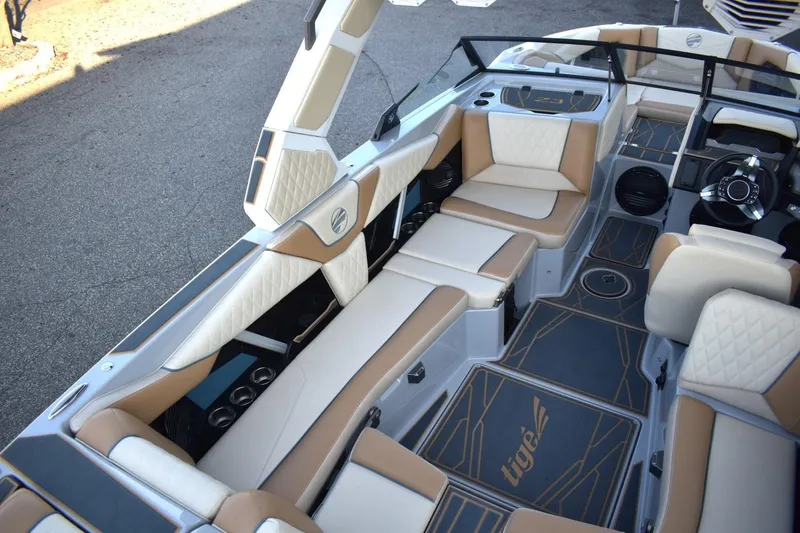 Slide: The Image of 2026 Tigé Z3 boat interior with luxurious seating and modern design. - 27