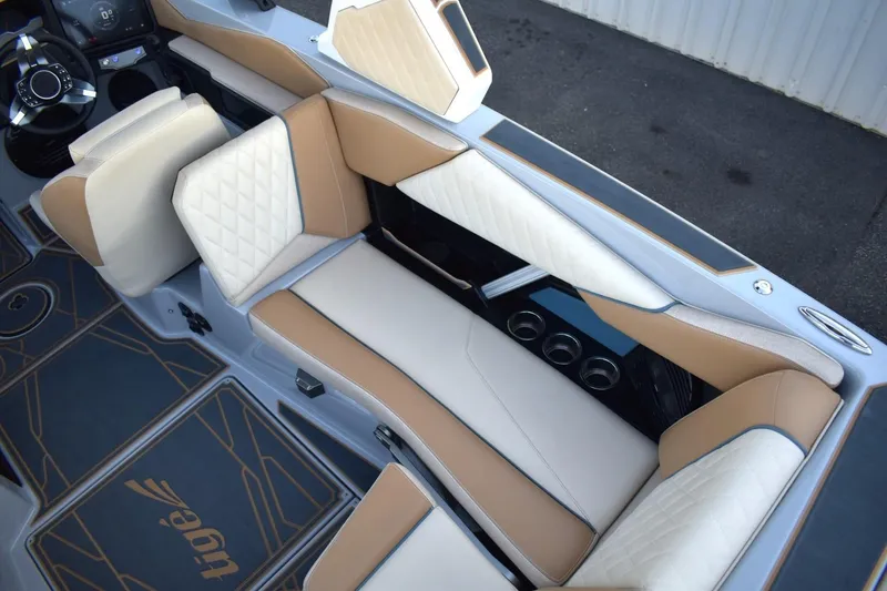 Slide: The Image of 2026 Tigé Z3 boat interior with beige and white seating, featuring diamond stitching and modern design. - 32