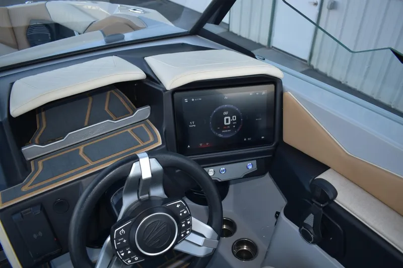 Slide: The Image of 2026 Tigé Z3 boat dashboard with touchscreen display and modern steering wheel. - 34