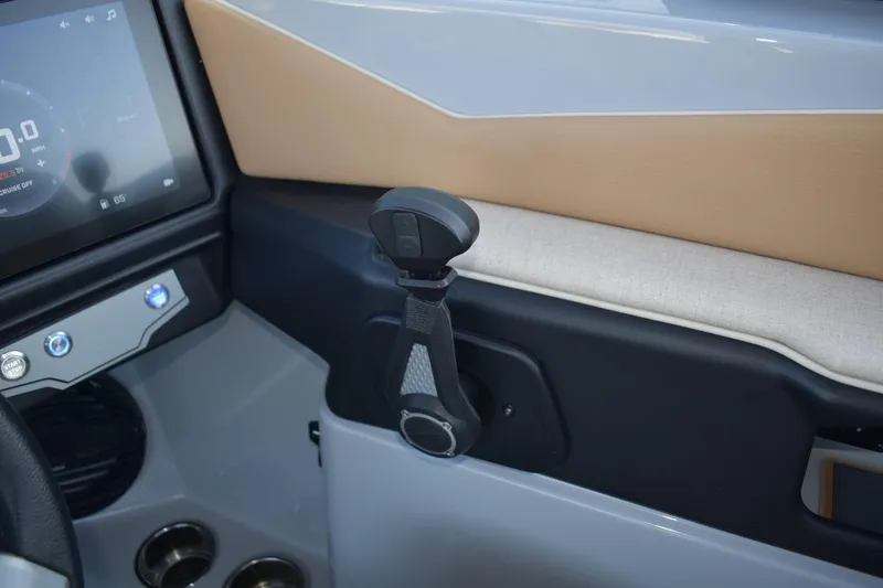 Slide: The Image of 2026 Tigé Z3 boat interior with modern dashboard and control lever. - 36