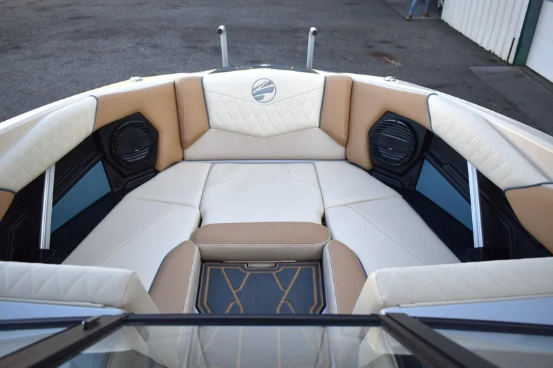 Slide: The Image of Luxurious interior of 2026 Tigé Z3 boat with beige and white seating. - 37