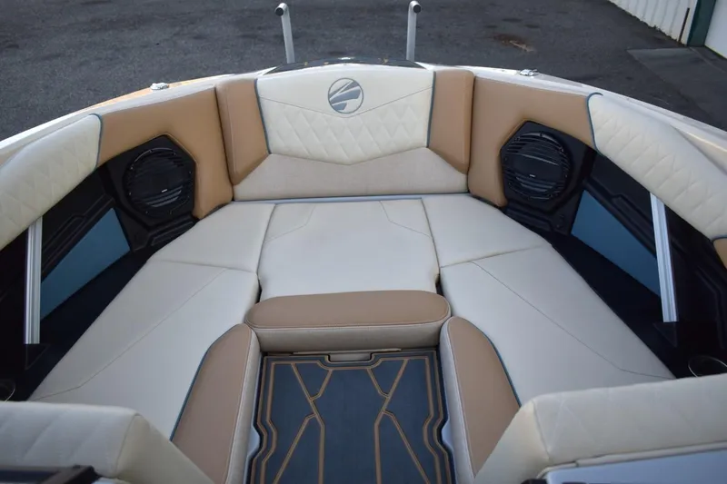 Slide: The Image of 2026 Tigé Z3 boat interior with beige and white cushioned seating. - 40